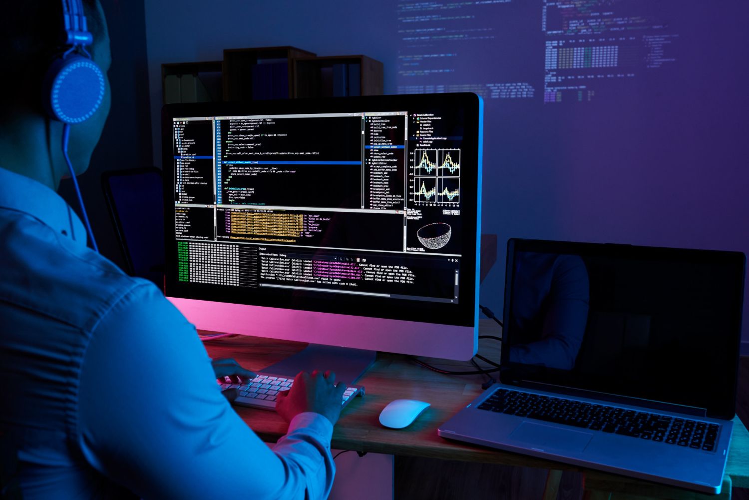 it-specialist-checking-code-computer-dark-office-night